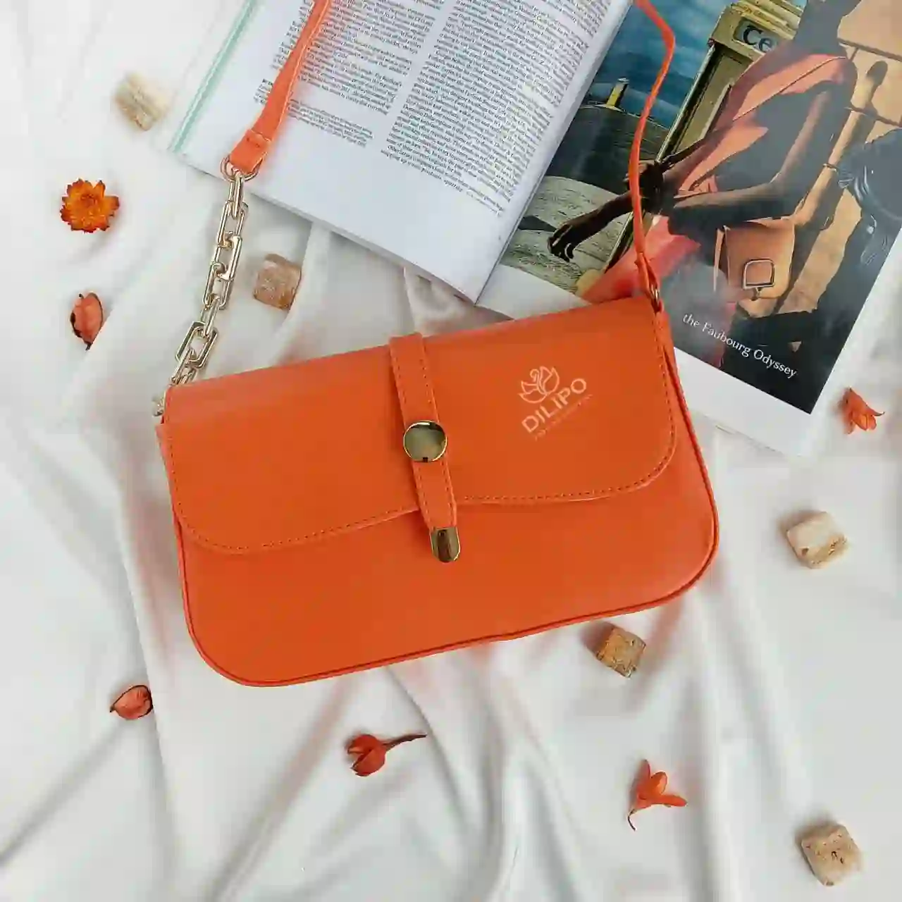 کیف دوشی زنانه نارنجی طرح تسمه ای